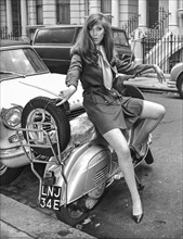 Young woman on lambretta during a photographic service, 1960's style