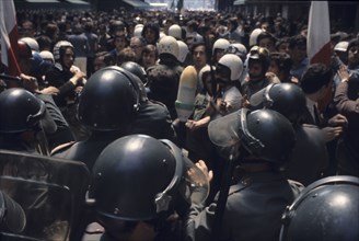 Police and demonstrating, 70's