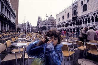 Children photographing san marco square, venice, italy, 70's