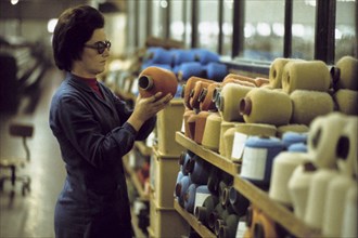 Woman worker in a textile factory, 70's