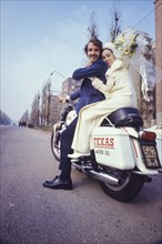 Bride and groom on motorbyke, 70's