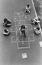 Children playing, 70's