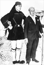 Leopold stokowsky with a royal guard at the acropolis in athens, 1962