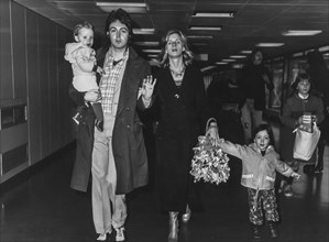 Paul mccartney and family, london airport, 1972