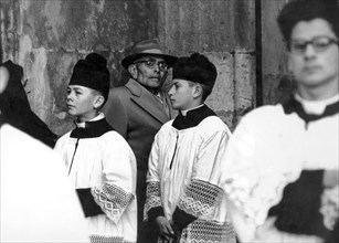 Altar boys at a catholic funeral, 70's