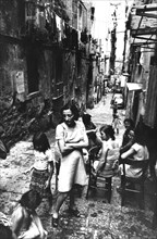Italy, naples, people in a street, 70's