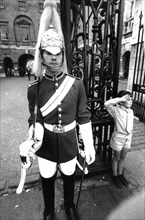 Children near a royal horse guard, london, uk, 70's
