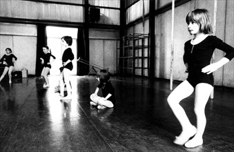 Caucasian little girl in a dance school, 70's