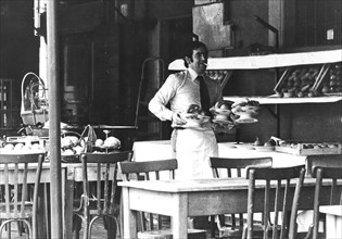 Waiter of al comparone restaurant, rome, italy, 1973