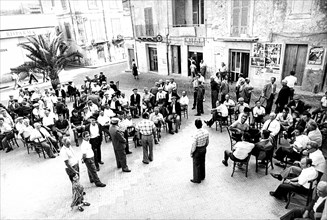 People in mazarino square, sicily, 1976