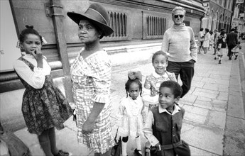 Black people familywalking in london, uk, 70's