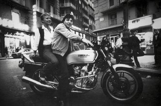 Couple riding a motorbyke, naples, italy, 80's