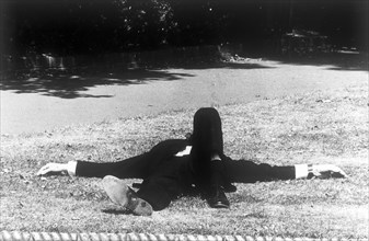 Uk, london, businessman relaxing at park, 70's
