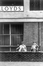 Uk, london, elderly men sitting on a bench, 70's