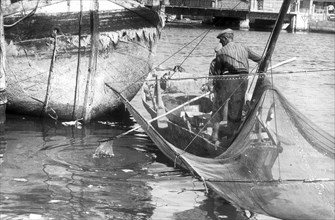 Fishermen in the port of Chioggia, 70