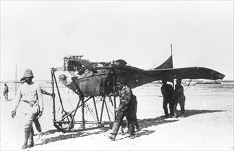 A plane after an accident, is transported in workshops camp in Libya, 1912