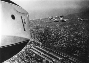 Italian hydroplanes by Italo Balbo flying over Chicago and then alight into Lake Michigan, 1933