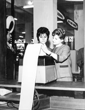 International Fair of Milan two women at a teletype, Milan, Italy, 1962
