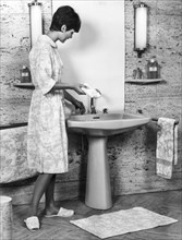 A woman in the bathroom, 1966