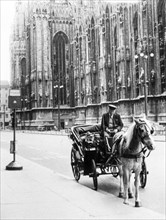 Carriage in Piazza del Duomo, Milan, Italy. 1966
