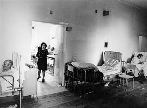 Patients in the corridors of the San Giovanni hospital, Rome, 70s
