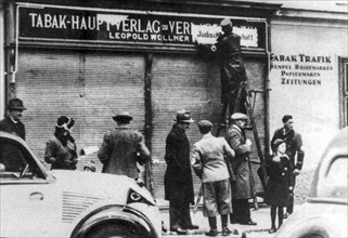 After the anschluss, Nazi plates were placed at Jewish stores
