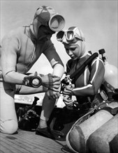 Champion Luciana Civico is preparing for a dive, 1962