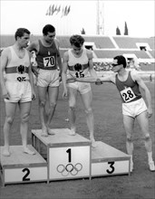 Livio berruti shaking hands with Sergio Ottolina on the podium, athletics, 1962