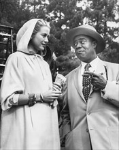 Grace kelly and louis armstrong, hollywood 1956