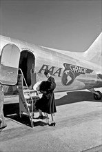 Woman Boarding Pan American-Grace Airway