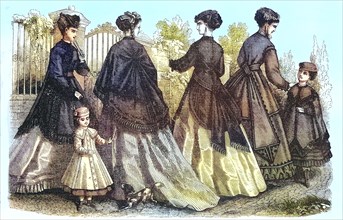 four women and two girls in current spring fashion