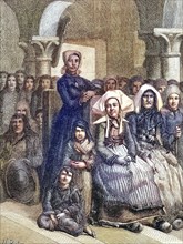 Women in typical costume in church during a service