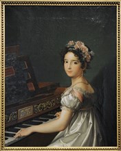 Manuela Gonzalez Velazquez playing the piano.
