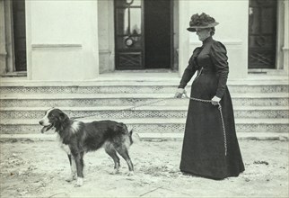 Countess PS Uvarova with a dog in the courtyard of the Krasnaya Gorka palace complex circa 1899