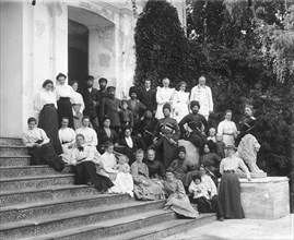 Countess PS Uvarova with family members and guests in the courtyard of the Krasnaya Gorka estate circa 1899