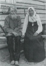 Elderly Russian man and woman in folk costume circa  before 1917