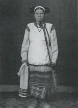 Russian woman in traditional folk costume circa  before 1917