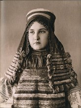 Young woman in cultural dress in South Russia