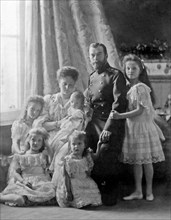 Nicholas II and family in a formal photograph
