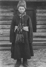 Russian boy in folk costume / traditional clothing circa  before 1917