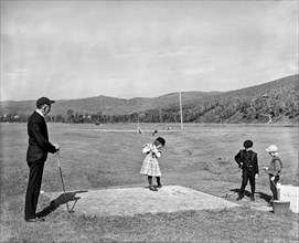Young Girl Plays Golf