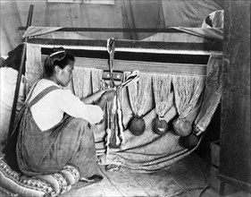 Chilkat Woman Weaving