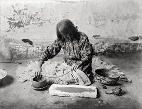 Zuni Woman Making Pot