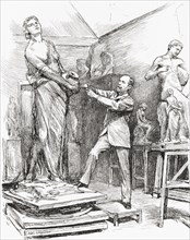 George A. Lawson at work in his studio.