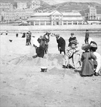 Playing on the beach in 1894.