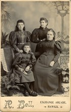 A family portrait of four ladies.