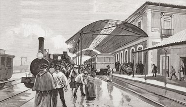 The arrival of a passenger train from Madrid at Cordoba station.