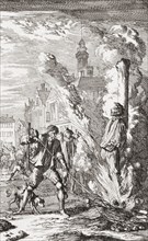 A heretic is burned at the stake in the 16th century.