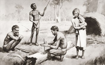 Australian Aborigines making fire.