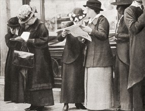 Crowds gather outside the Cunard offices in London to read the news of the sinking of the Lusitania by a German U-boat in 1915.